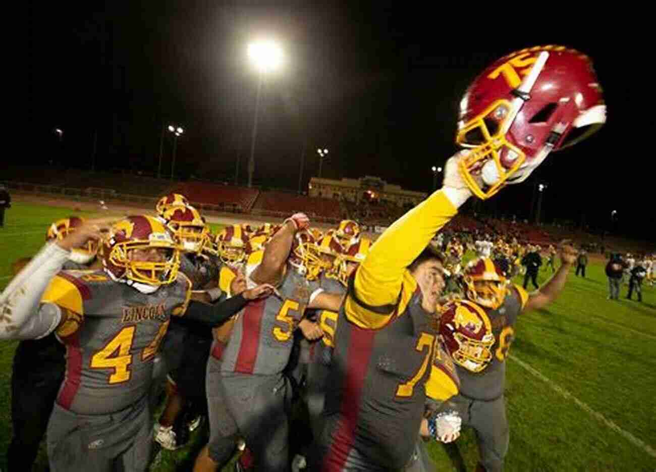 A Championship High School Football Team Celebrating Their Victory How To Build A Thick Institution: Organizational Lessons From A Championship High School Football Program