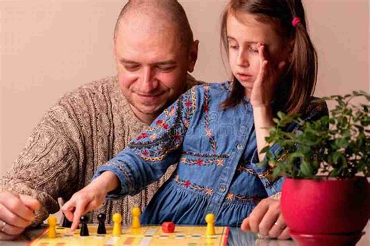 A Father And His Children Having Fun Playing Board Games 10 Things Great Dads Do: Strategies For Raising Great Kids