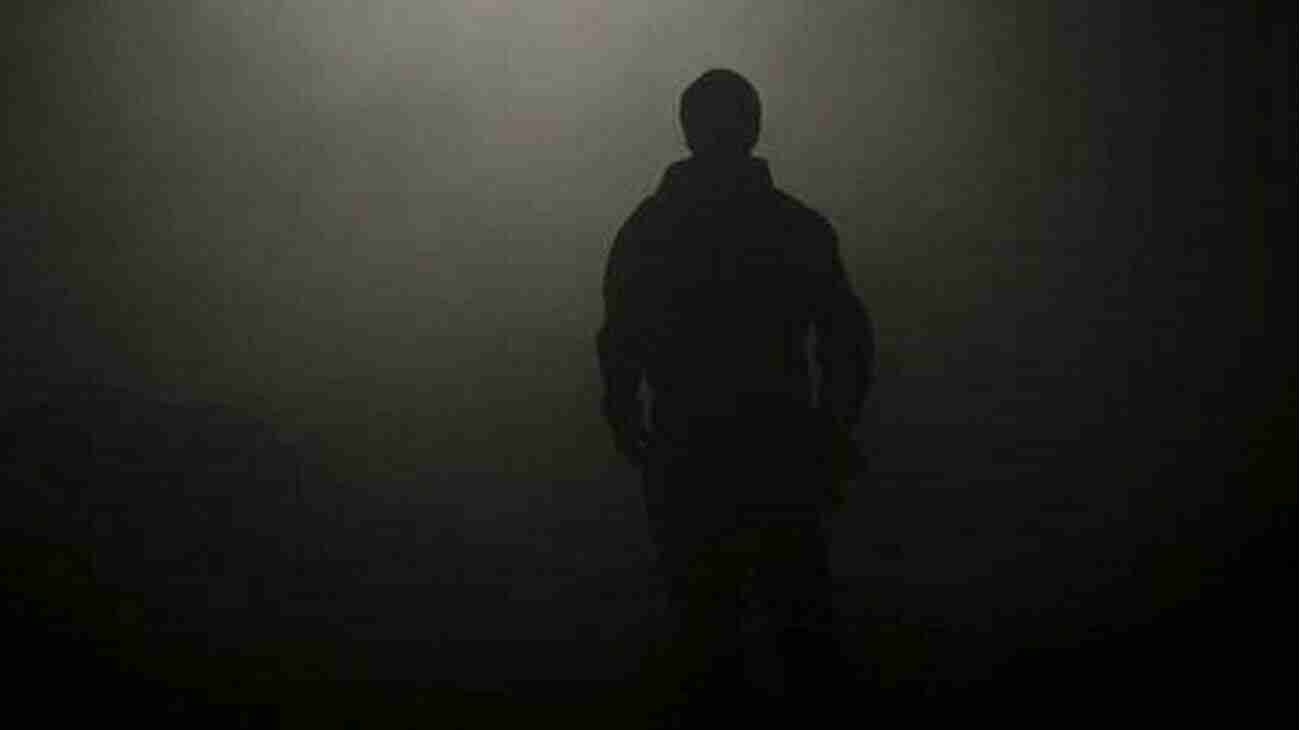 A Man Standing Mysteriously In A Dimly Lit Room My Brother S Secret Dan Smith