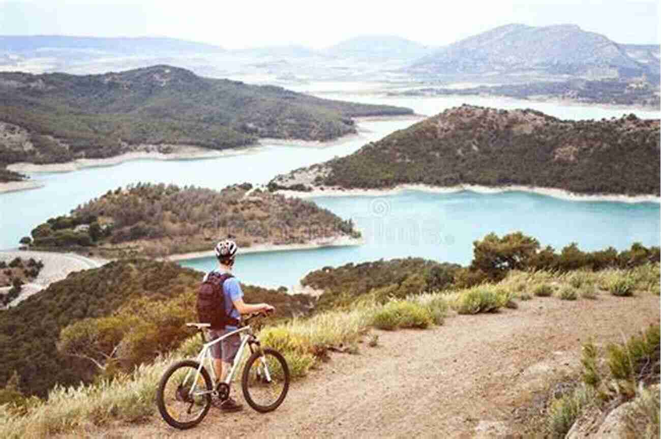 Cyclist Enjoying Panoramic Views On Trail D Mountain Biking Moab: More Than 40 Of The Area S Greatest Off Road Bicycle Rides (Regional Mountain Biking Series)