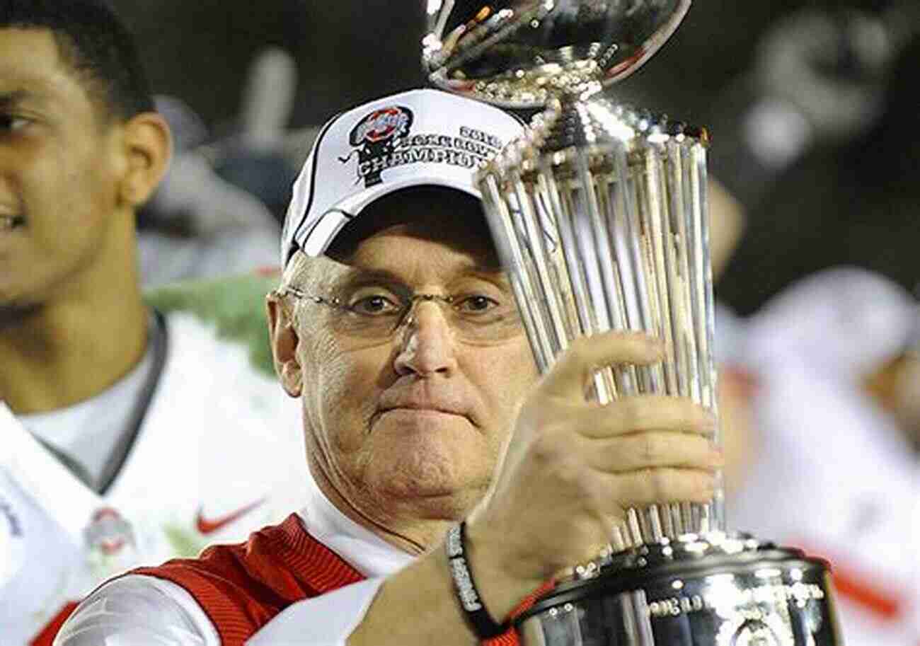 Jim Tressel Holding The Championship Trophy More Than A Coach: What It Means To Play For Coach Mentor And Friend Jim Tressel