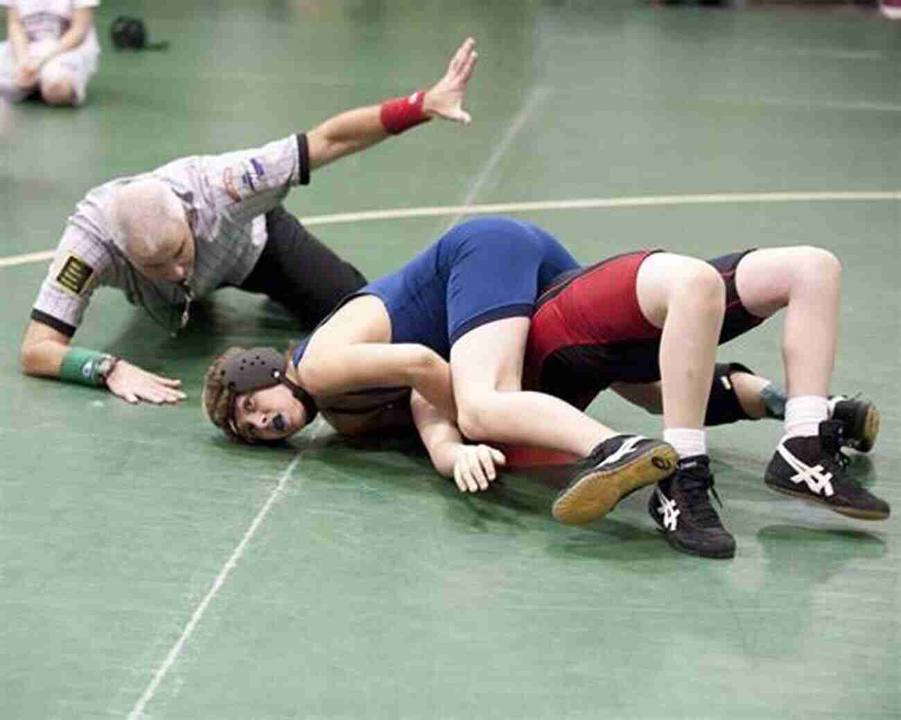 Middle School Wrestler Performing Bodyweight Exercises Wrestling Strength Training For Middle School Wrestlers: Results PROVEN Wrestling Strength Workouts To Help Middle School Wrestlers Train Safely Effectively