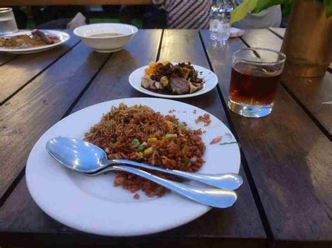 Nasi Goreng: Authentic Indonesian Fried Rice With A Mouthwatering Combination Of Flavors EAT LIKE A LOCAL INDONESIA: INDONESIA Food Guide