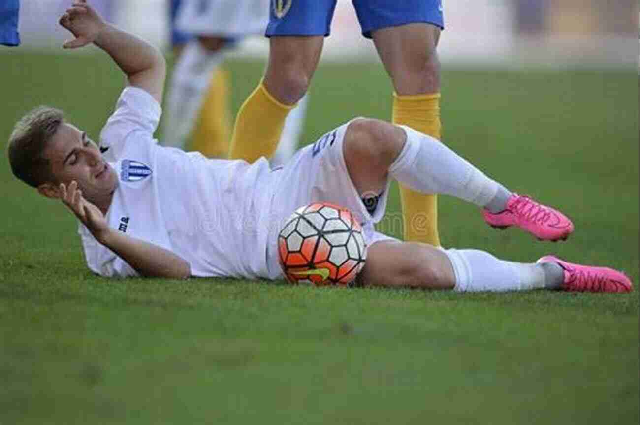 Player Demonstrating A Slide Tackle During A Defending Practice The Soccer Academy: 100 Defending Practices And Small Sided Games