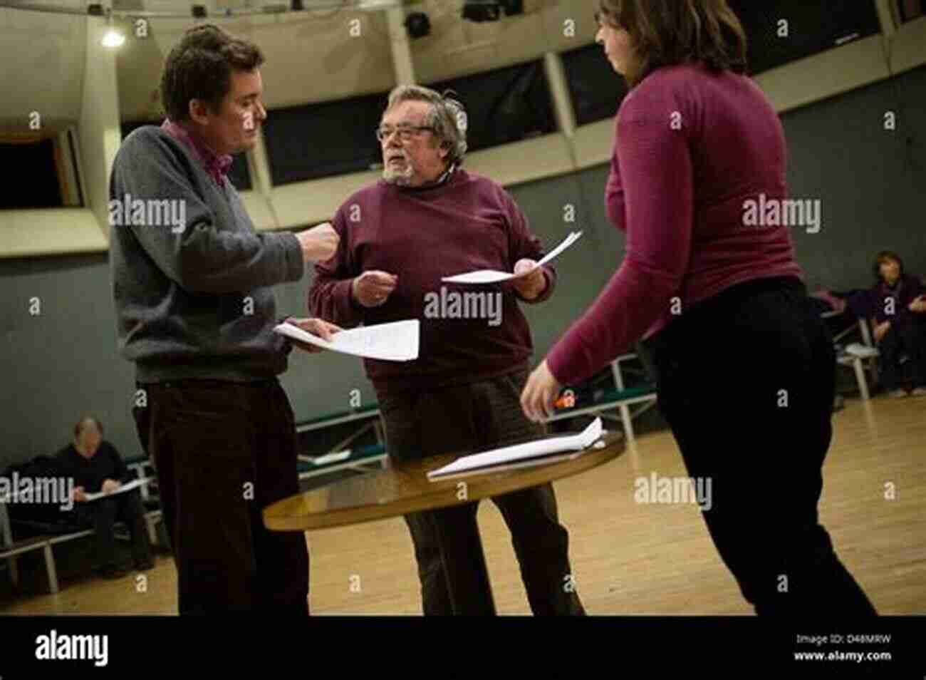 Theatre Director With A Group Of Actors In A Rehearsal Room, Discussing A Play Scene The Cambridge To Theatre Directing (Cambridge s To Literature)