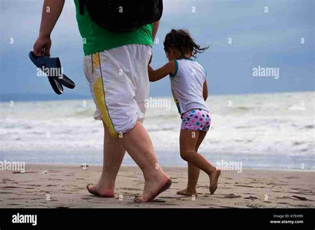 Father And Daughter Holding Hands At The Beach At Daddy S Hands: Courage Knows No Age